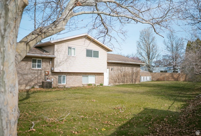 20 E 9n Cir N, American Fork, UT 84003 - view of side of home with brick siding, fence, and a lawn