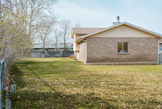 20 E 9n Cir N, American Fork, UT 84003 - exterior space with brick siding, fence, and a lawn