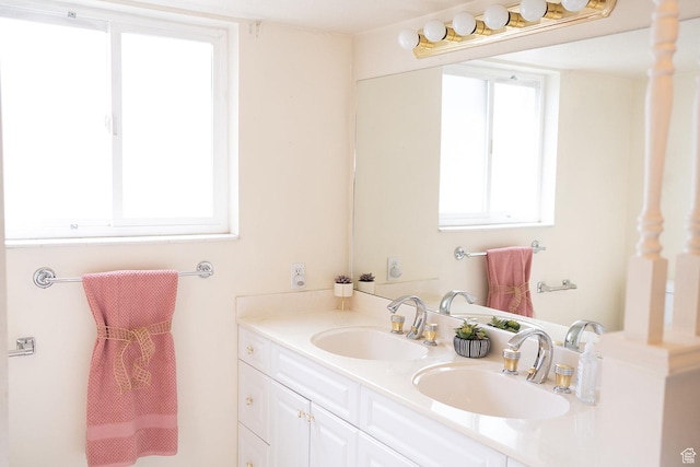 20 E 9n Cir N, American Fork, UT 84003 - bathroom with double vanity, a sink, and a healthy amount of sunlight