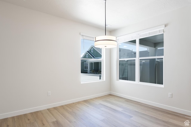 3782 S 4250 W Unit 429C, West Haven, UT 84401 - spare room featuring wood finished floors and baseboards