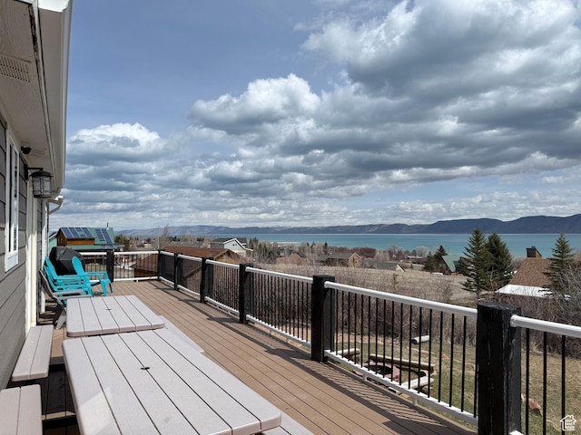 288 W Stuart Dr, Garden City, UT 84028 - wooden terrace featuring a water and mountain view