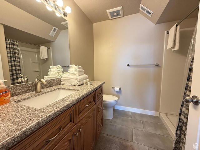 288 W Stuart Dr, Garden City, UT 84028 - bathroom with baseboards, vaulted ceiling, tile patterned floors, toilet, and visible vents