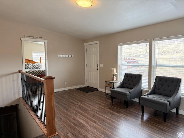 288 W Stuart Dr, Garden City, UT 84028 - entrance foyer with baseboards, vaulted ceiling, and dark wood finished floors