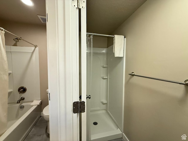 288 W Stuart Dr, Garden City, UT 84028 - bathroom featuring toilet, tile patterned floors, shower / bath combination with curtain, and visible vents