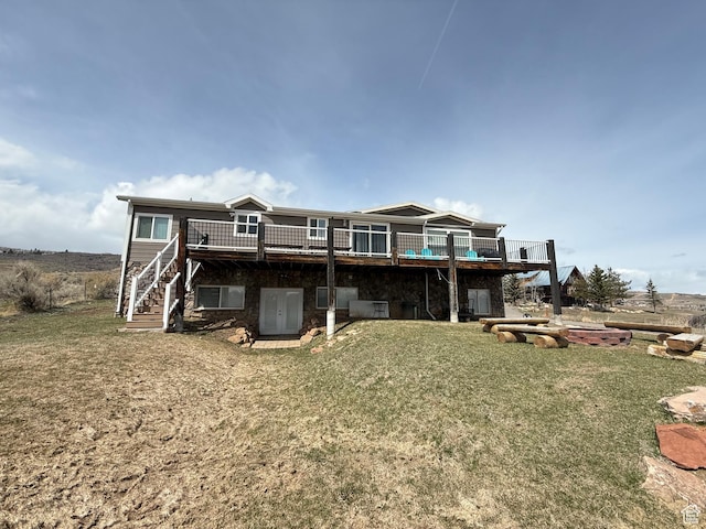 288 W Stuart Dr, Garden City, UT 84028 - back of house featuring a yard and a deck
