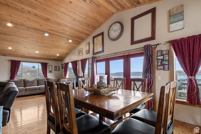 671 W Dee Dr, Garden City, UT 84028 - dining space featuring a mountain view, recessed lighting, light wood-style floors, high vaulted ceiling, and wooden ceiling