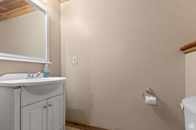 671 W Dee Dr, Garden City, UT 84028 - bathroom featuring toilet and vanity