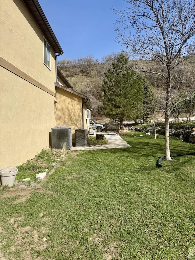 87 N Loafer Canyon Rd, Elk Ridge, UT 84651 - view of yard featuring cooling unit and a patio area
