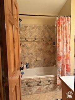 87 N Loafer Canyon Rd, Elk Ridge, UT 84651 - bathroom with tiled shower / bath combo and vanity