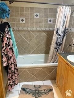 87 N Loafer Canyon Rd, Elk Ridge, UT 84651 - full bath featuring tiled shower / bath, vanity, and tile patterned flooring
