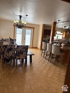 87 N Loafer Canyon Rd, Elk Ridge, UT 84651 - dining area featuring an inviting chandelier and baseboards