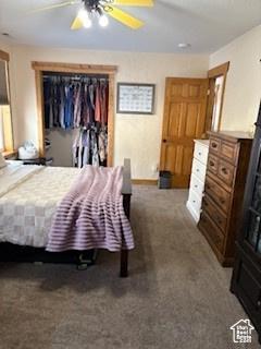 87 N Loafer Canyon Rd, Elk Ridge, UT 84651 - carpeted bedroom with ceiling fan