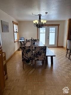 87 N Loafer Canyon Rd, Elk Ridge, UT 84651 - dining room with a chandelier and baseboards