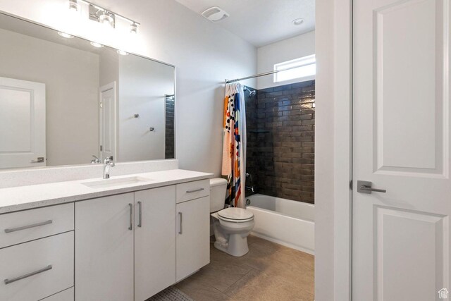 4582 S Sophia Ln, Washington, UT 84780 - bathroom with visible vents, toilet, shower / bath combo with shower curtain, vanity, and tile patterned flooring