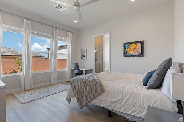 4582 S Sophia Ln, Washington, UT 84780 - bedroom with ensuite bath, visible vents, recessed lighting, wood finished floors, and baseboards