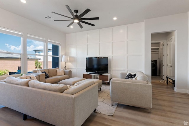 4582 S Sophia Ln, Washington, UT 84780 - living area featuring visible vents, a decorative wall, ceiling fan, light wood-style floors, and recessed lighting