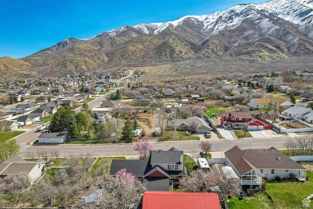 aerial view featuring a mountain view and a residential view