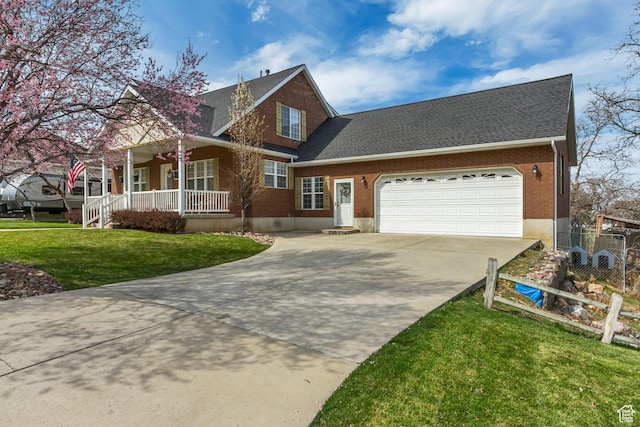 view of front of house with concrete driveway, an attached garage, a front yard, brick siding, and covered porch