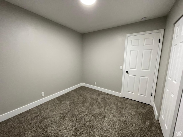 3977 W 5625 S, Roy, UT 84067 - unfurnished room featuring baseboards and dark carpet