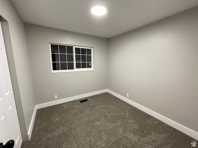 3977 W 5625 S, Roy, UT 84067 - empty room featuring baseboards, visible vents, and dark colored carpet