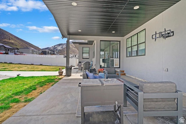 393 S Corner View Dr, Tooele, UT 84074 - view of patio featuring a mountain view and an outdoor hangout area