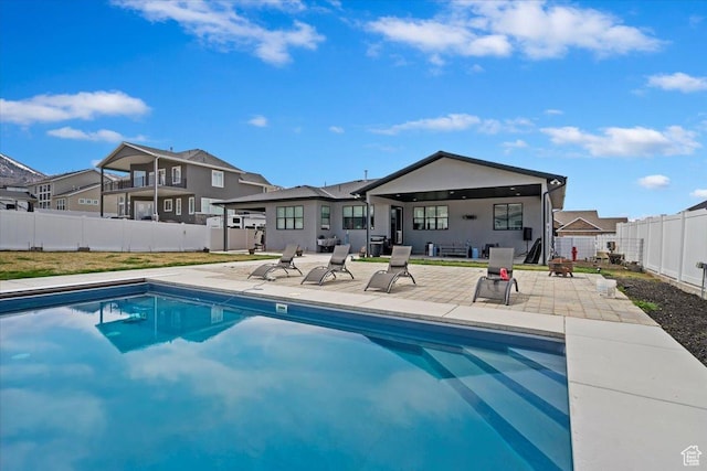 393 S Corner View Dr, Tooele, UT 84074 - back of property with a patio, a fenced backyard, and a residential view