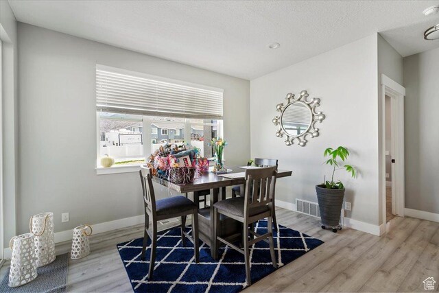 393 S Corner View Dr, Tooele, UT 84074 - dining room featuring wood finished floors and baseboards