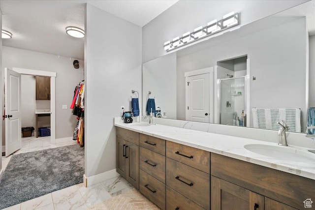 393 S Corner View Dr, Tooele, UT 84074 - full bath featuring marble finish floors, a shower stall, double vanity, a spacious closet, and baseboards
