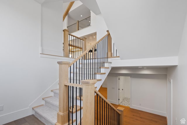 1682 N 2250 W, Provo, UT 84604 - stairs with baseboards, wood finished floors, and a towering ceiling