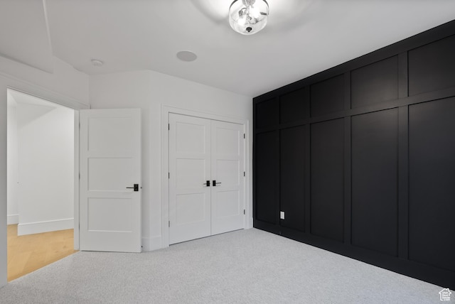 1682 N 2250 W, Provo, UT 84604 - unfurnished bedroom with baseboards, light carpet, and a closet
