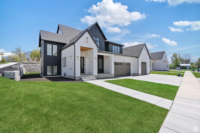 1682 N 2250 W, Provo, UT 84604 - modern farmhouse style home with a garage, a front lawn, driveway, and a shingled roof