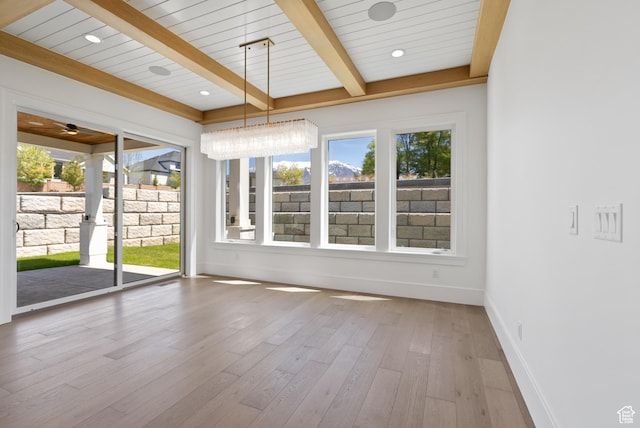 1682 N 2250 W, Provo, UT 84604 - interior space featuring baseboards, beamed ceiling, a ceiling fan, and wood finished floors