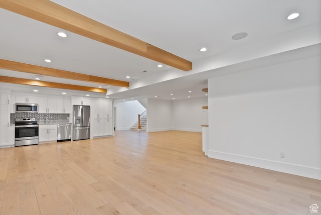 1682 N 2250 W, Provo, UT 84604 - unfurnished living room featuring stairs, beam ceiling, baseboards, recessed lighting, and light wood-type flooring