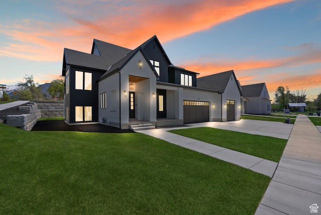 1682 N 2250 W, Provo, UT 84604 - modern farmhouse with a garage, a lawn, stucco siding, and concrete driveway