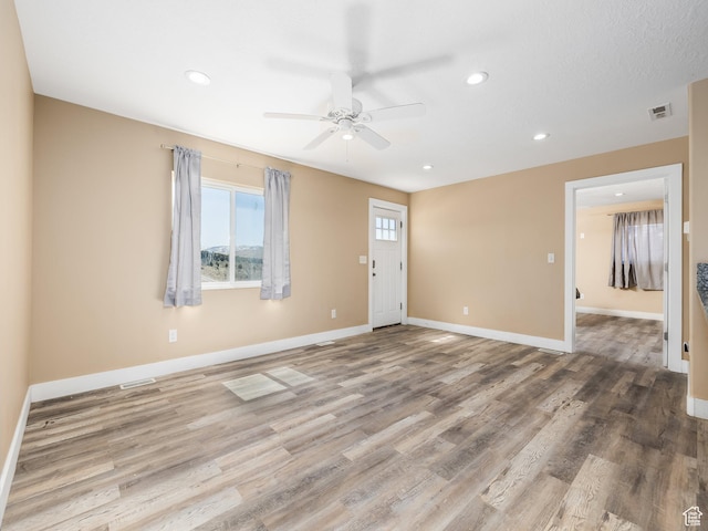 8915 E 33550 N, Fairview, UT 84629 - unfurnished room featuring wood finished floors, baseboards, a ceiling fan, and recessed lighting
