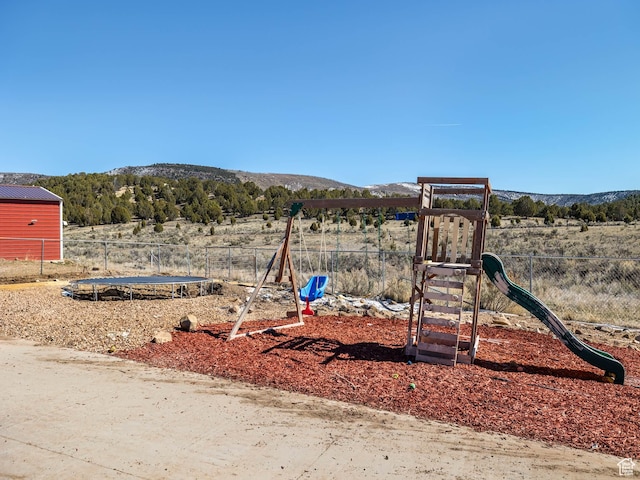8915 E 33550 N, Fairview, UT 84629 - view of jungle gym with a mountain view and fence