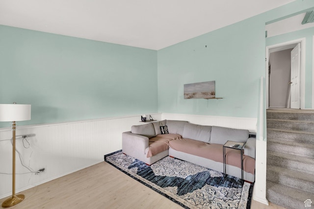 1841 S Nevada Ave, Provo, UT 84606 - living room featuring a wainscoted wall, wood finished floors, and stairway