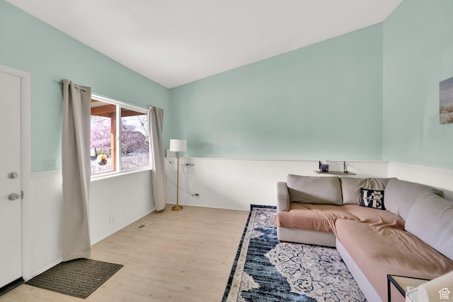 1841 S Nevada Ave, Provo, UT 84606 - living area with wainscoting, wood finished floors, and vaulted ceiling