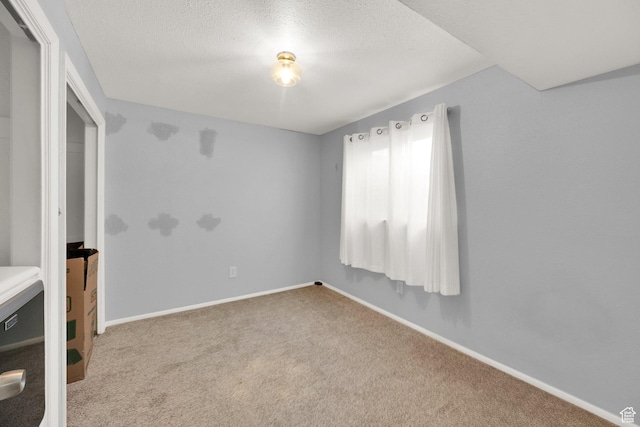1841 S Nevada Ave, Provo, UT 84606 - unfurnished room with carpet, a textured ceiling, and baseboards