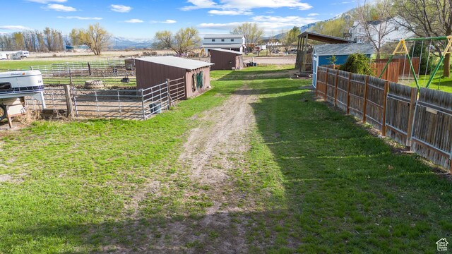80 S 6000 W, Mendon, UT 84325 - view of yard featuring a mountain view, an exterior structure, and an outdoor structure