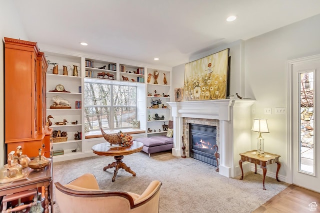 3895 S Grindstone Dr, Springville, UT 84663 - sitting room featuring a tiled fireplace, plenty of natural light, and recessed lighting