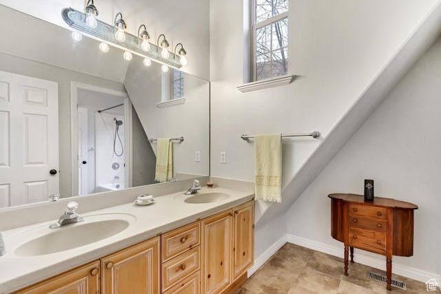 3895 S Grindstone Dr, Springville, UT 84663 - full bathroom featuring baseboards, double vanity, a sink, and visible vents