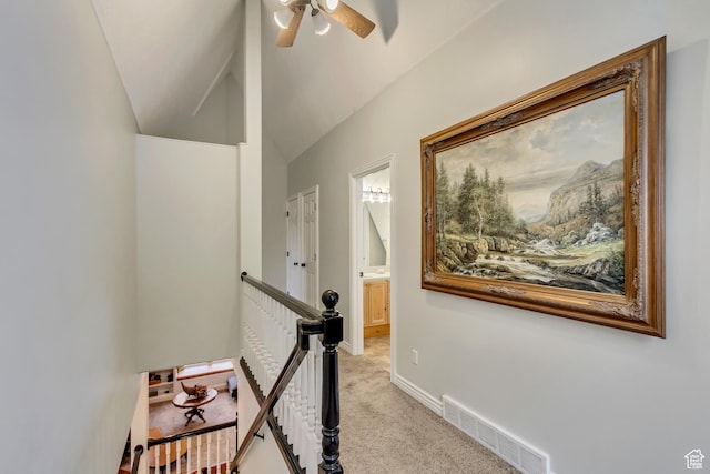 3895 S Grindstone Dr, Springville, UT 84663 - corridor with baseboards, vaulted ceiling, an upstairs landing, visible vents, and light colored carpet