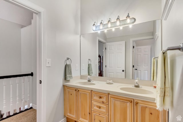 3895 S Grindstone Dr, Springville, UT 84663 - full bath with double vanity, a sink, and baseboards