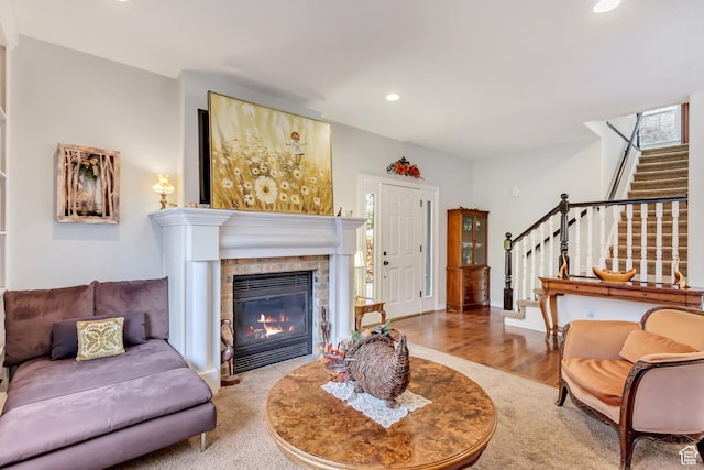 3895 S Grindstone Dr, Springville, UT 84663 - living area featuring a fireplace with flush hearth, wood finished floors, recessed lighting, and stairs
