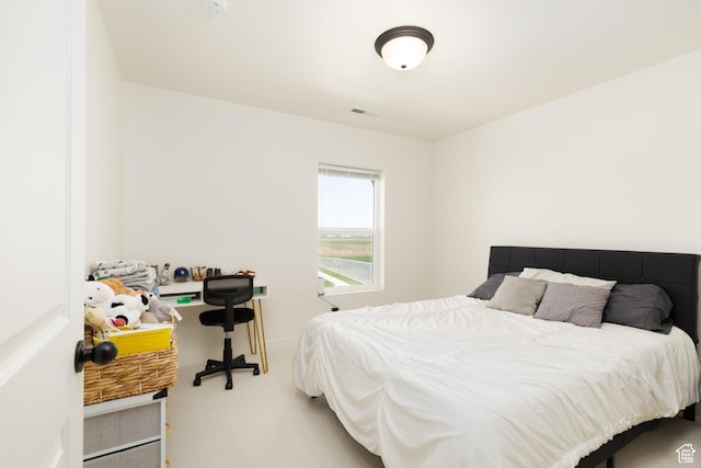 bedroom featuring visible vents and carpet floors