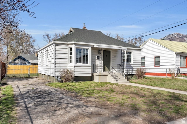 142 Ray St, Ogden, UT 84404 - bungalow-style house featuring fence and a shingled roof