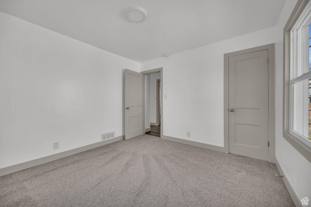 142 Ray St, Ogden, UT 84404 - empty room featuring baseboards, visible vents, and carpet floors