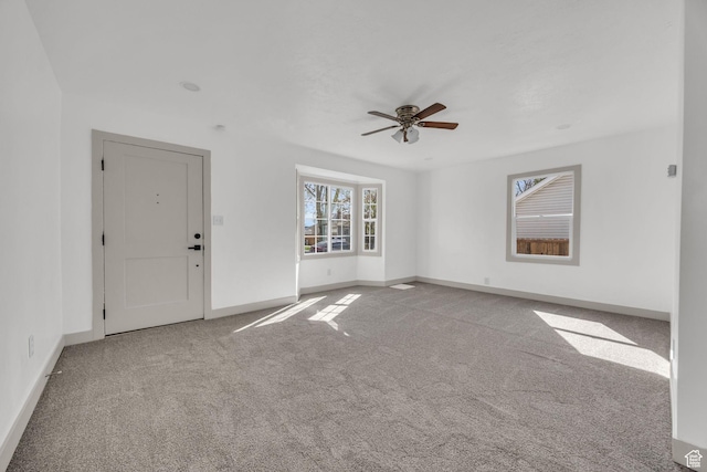 142 Ray St, Ogden, UT 84404 - spare room featuring ceiling fan, baseboards, and carpet floors