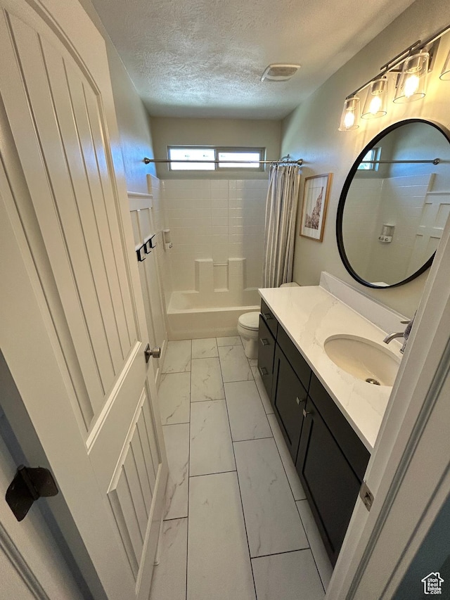 10124 S Autumn Breeze Ln W, South Jordan, UT 84009 - full bathroom featuring a textured ceiling, vanity, toilet, marble finish floor, and shower / tub combo